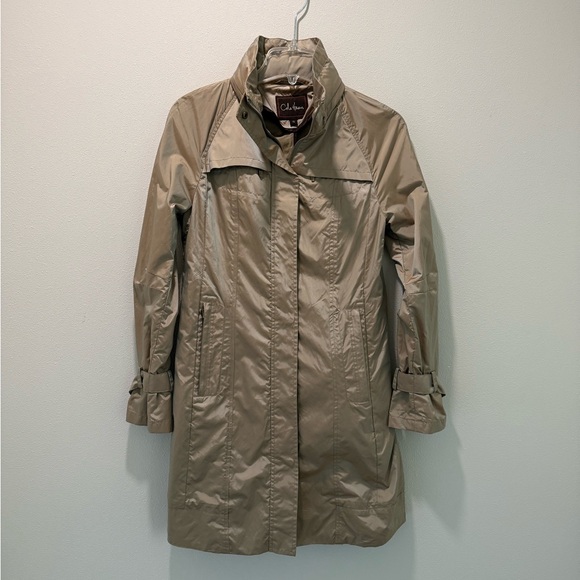 Cole Haan Jackets & Blazers - Cole Haan Chic Rain Coat with back bow & hideaway hood. Iridescent beige in XS.